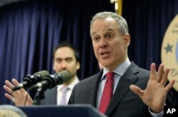 FILE - Two weeks after officials in 24 states asked Donald Trump to kill one of President Barack Obama's plans to curb global warming, New York Attorney General Eric Schneiderman was the lead author on a rebuttal letter signed by Democratic attorneys general in 15 states, plus four cities and counties, asking the president-elect to save it.