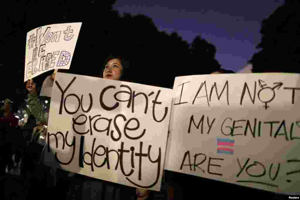 People rally to protest the Trump administration&#39;s reported transgender proposal to narrow the definition of gender to male or female at birth, in Los Angeles, California, Oct. 22, 2018.