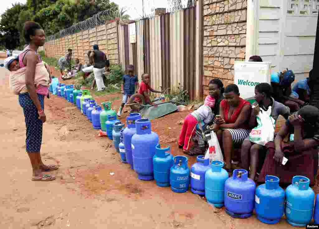 People queue for gas in Harare, Zimbabwe.