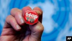 File - A pin reading "Stop TB" is shown after presentation of WHO report Global Tuberculosis Control at the United Nations headquarters, Geneva, Switzerland.