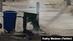 Police say a pipe bomb in this trash can exploded shortly before a charity race in Seaside Park, N.J., Sept. 17, 2016.