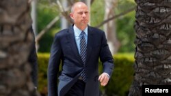 FILE - Attorney Michael Avenatti makes an initial appearance on charges of bank and wire fraud as he arrives at federal court in Santa Ana, California, April 1, 2019. 