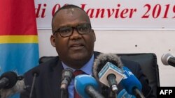 Le président de la Commission électorale nationale indépendante (CENI) de la RDC, Corneille Nangaa Yobeluo, annonce les résultats provisoires de l'élection présidentielle à Kinshasa du 10 janvier 2019.