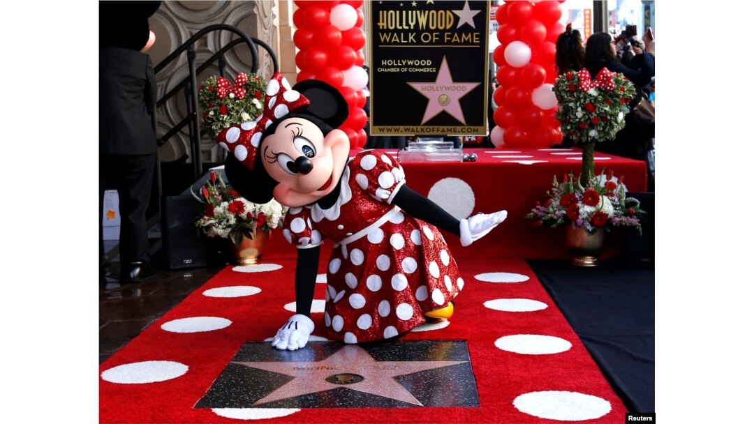 Here's why Minnie Mouse is ditching the iconic red polka dot dress -  Entertainment News