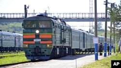A train, transporting North Korean leader Kim Jong-il, arrives at Khasan Station after crossing the border between North Korea and Russia, near Russia's far eastern city of Vladivostok, August 20, 2011