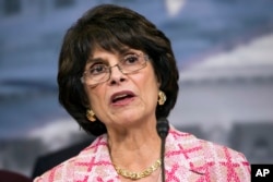 FILE - Rep. Lucille Roybal-Allard, D-California, opposed to immigration raids targeting Central American families with children.