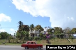 Colorful homes are common throughout Havana, and beyond, such as in this neighboring village.