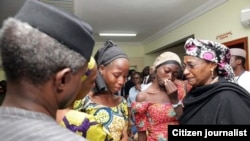 Nigerian vice president, Yemi Osinbajo and other officials meeting with the 21 Chibok girls released by Boko Haram militants October 13, 2016 at the DSS Hospital in Abuja.