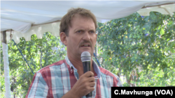 Doug Taylor Freeme, a former leader of the predominantly white Zimbabwe Commercial Farmers Union, spoke at a public meeting in Chinhoyi town, Zimbabwe, May 10, 2019.