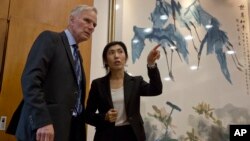 United Nations Special Rapporteur on extreme poverty and human rights, Philip Alston prepares for a press conference held in Beijing, China, Aug. 23, 2016. 