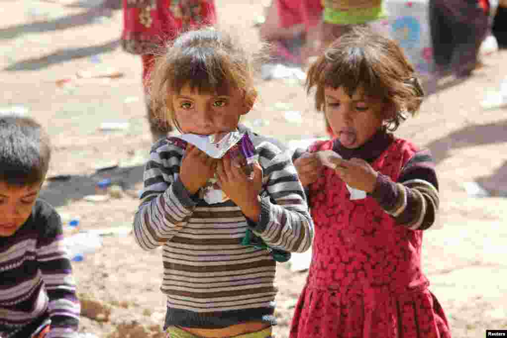 Sunni Muslim children, who fled Hawija - one of the Islamic State's strongholds - arrive in the southwestern area of Kirkuk, Iraq.