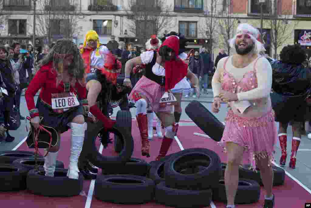 Competitors take part in a men&#39;s high heels race in Madrid, Spain.