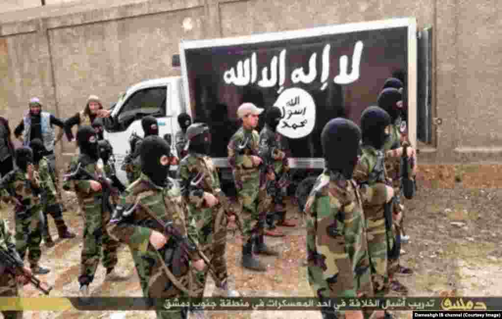 Young boys receive military training at a camp south of Damascus, Syria.