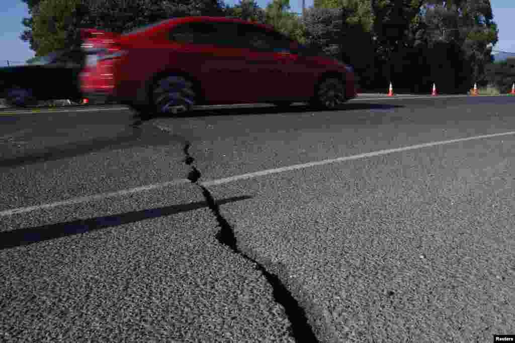 Cracked asphalt along Highway 12, Napa, California, Aug. 24, 2014.