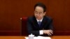 Aide to China's Former Leader Gets Life in Prison for Bribes