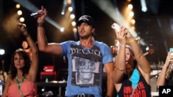 Luke Bryan performs at the 2013 CMA Music Festival at LP Field on June 6, 2013 in Nashville Tennessee.