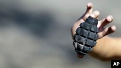 FILE: Representative illustration of a hand grenade, similar to the one that exploded in DRVC causing two child fatalities. Taken September 14, 2014.