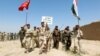 Iraqi Shi'ite Militias Pledge to Take Part in Next IS Fight