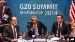 FILE - President of France Francois Hollande, U.S. President Barack Obama, Britain's Prime Minister David Cameron and Germany's Chancellor Angela Merkel at the G20 leaders summit in Brisbane, Australia, Nov. 2014.