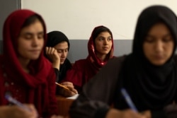 Girls attend lessons at their orphanage in Kabul, Afghanistan, October 10, 2021. REUTERS/Jorge Silva