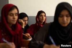 Girls attend lessons at their orphanage in Kabul, Afghanistan, October 10, 2021. REUTERS/Jorge Silva