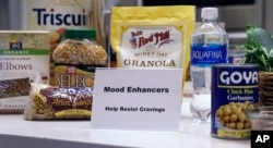 In this Thursday, March 15, 2018, photo, a selection of whole grain and healthier food options are displayed during a "Cooking for Recovery" class at the Boston Medical Center in Boston.