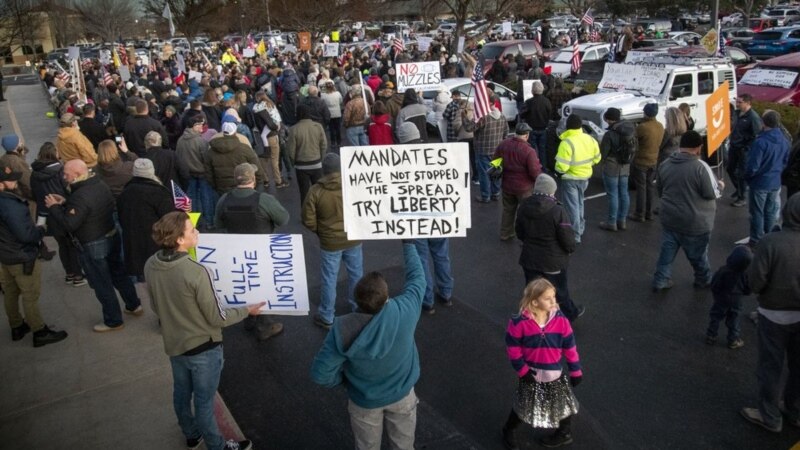 Tensions Rise over Masks as Virus Spreads in Smaller US Cities