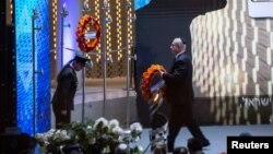 Israeli Prime Minister Benjamin Netanyahu lays a wreath during a ceremony on Memorial Day, when Israel commemorates its fallen soldiers, at Mount Herzl in Jerusalem, May 8, 2019. 
