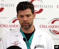 Dr. Chadwick Smith, one of the doctors who treated victims of the Pulse nightclub shooting, describes how he and others called for reinforcements that night, at a news conference at the Orlando (Fla.) Regional Medical Center, June 14, 2016.