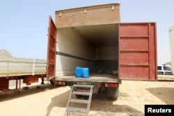 A lorry container where eight migrants including six children were found dead is seen, on the west Libyan coast, in Zuwara city, Libya, July 16, 2018.