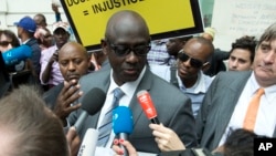 FILE - Rwandan Minister of Justice Johnston Busingye.