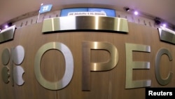 A table with OPEC logo is seen during the presentation of OPEC's World Oil Outlook in Vienna.