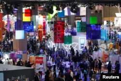 Visitors attend Viva Tech, a gathering of high-profile startups and high-tech leaders, May 16-18, 2019, in Paris.