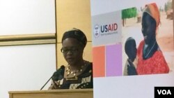 VOA Zimbabwe Service Chief, Ndimyake Mwakalyelye moderating the USAID program, Dec. 9, 2015.