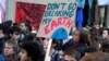 Youths demonstrate for climate change during the "Fridays for Future" school strike, in front of the Ecology Ministry in Paris, France, Feb. 15, 2019. 