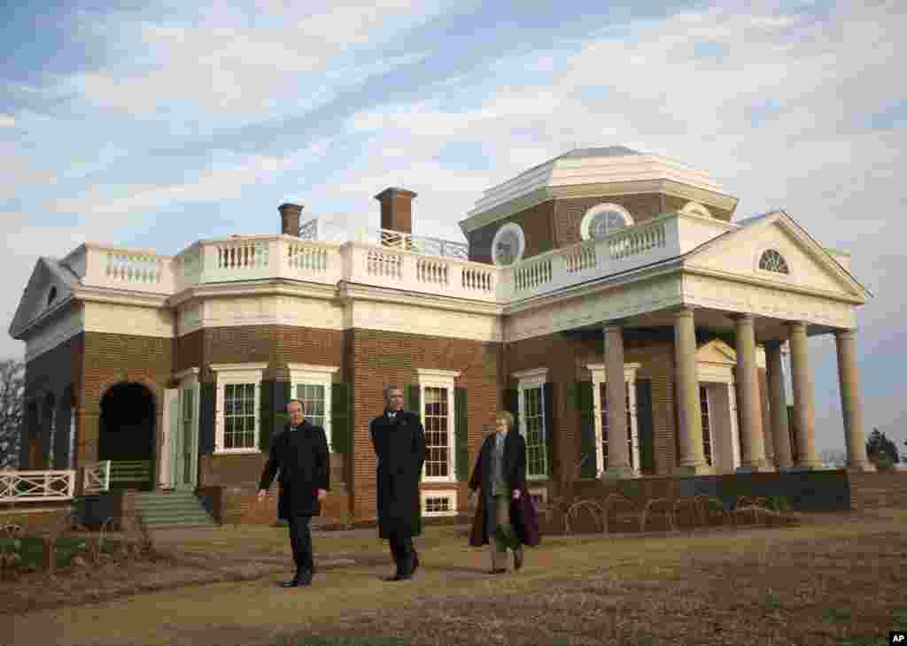 President Barack Obama and French President Francois Hollande tour the grounds of Monticello, President Thomas Jefferson's estate in Charlottesville, Virginia, Feb. 10, 2014.