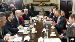 U.S. President Barack Obama meets with leaders of the European Union to discuss economic issues at the White House in Washington November 28, 2011