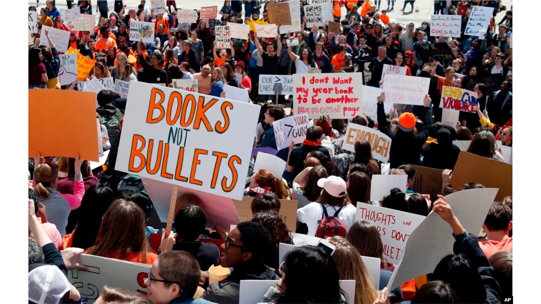 Hundreds of students gather, April 20, 2018, at the Capitol in St. Paul, Minn., to protest gun violence, part of a national high school walkout on the 19th anniversary of the Columbine shootings.