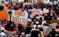 Hundreds of students gather, April 20, 2018, at the Capitol in St. Paul, Minn., to protest gun violence, part of a national high school walkout on the 19th anniversary of the Columbine shootings.