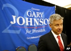 FILE - Libertarian presidential candidate Gary Johnson speaks to supporters and delegates at the National Libertarian Party Convention in Orlando, Fla., May 27, 2016.