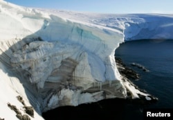 FILE - A record-size hole in the ozone layer has appeared over Antarctica. Shown here is a cliff face at Landsend, on the coast of Cape Denison.