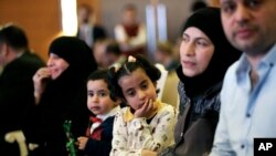 Syrian refugees attend the launch of an education program in Ankara, Turkey, June 8, 2017. Turkey, the European Union and UNICEF formally launched an EU-funded project to encourage Syrians and other refugees in Turkey to enroll their children in schools.