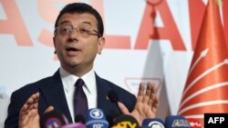 Turkey's main opposition party CHP candidate Ekrem Imamoglu, who claimed victory as Istanbul's mayor, speaks during a press conference at the CHP's Election Coordination Centre in Istanbul, April 3, 2019.