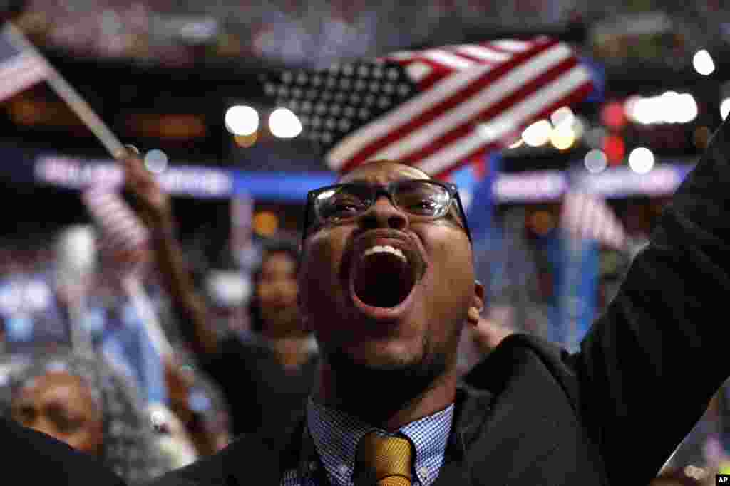 A supporter cheers as Democratic presidential nominee Hillary Clinton speaks during the final day of the Democratic National Convention in Philadelphia, July 28, 2016.