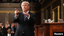 President Donald Trump reacts after delivering his first address to a joint session of Congress from the floor of the House of Representatives iin Washington, Feb. 28, 2017. 