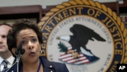U.S. Attorney General Loretta Lynch announces an indictment against nine FIFA officials and five corporate executives for racketeering, conspiracy and corruption at a news conference, in Brooklyn, New York, May 27, 2015. (AP Photo/Mark Lennihan) 