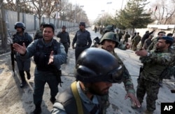 Security forces inspect the site of an Islamic State-claimed attack on a hospital in Kabul, Afghanistan, March 8, 2017. Sheikh Abdul Hasib was the mastermind behind the hospital attack that killed more than 30 people and injured 80 others, the Afghan Presidential Palace said in a statement.