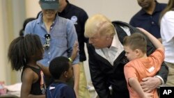 President Donald Trump and Melania Trump meet people affected by Hurricane Harvey during a visit to the NRG Center in Houston, Texas, Sept. 2, 2017. It was his second trip to Texas in a week, and his first order of business was to meet with those affected by the record-setting rainfall and flooding. He also traveled to Lake Charles, Louisiana, another hard-hit area.