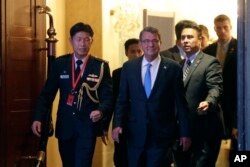 U.S. Defense Secretary Ash Carter arrives for the Opening Dinner of the 15th International Institute for Strategic Studies Shangri-la Dialogue, or IISS, Asia Security Summit on Friday, June 3, 2016, in Singapore.