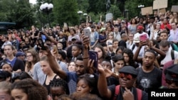 Black Lives Matter supporters, protesting the police killings of Alton Sterling and Philandro Castile days earlier, march along Manhattan streets in New York, July 8, 2016. 